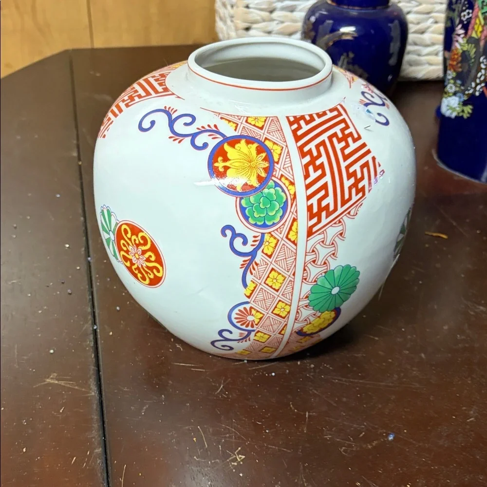 Decorative Porcelain Temple Jar with Red, Green and Gold Floral Motifs